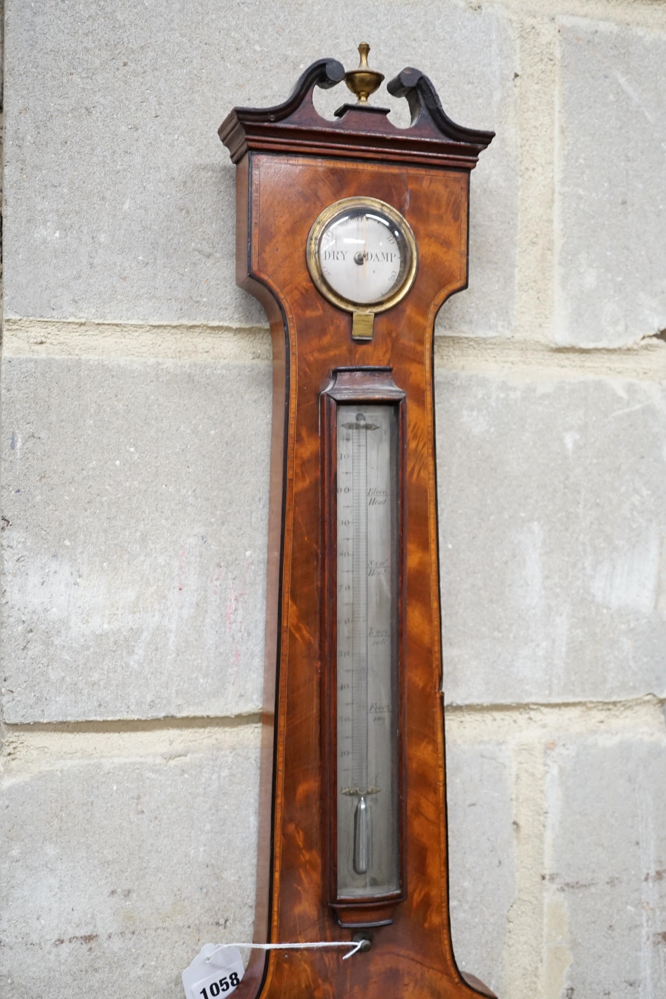 P Salmoni of Bath. A Regency ebony strung mahogany wheel barometer, height 110cm